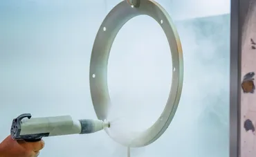 Powder coating a precision metal ring component — Baked Industries